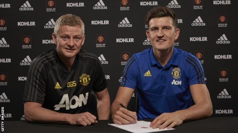 New signing, Harry Maguire with Man Utd boss Ole Gunnar Solskjaer